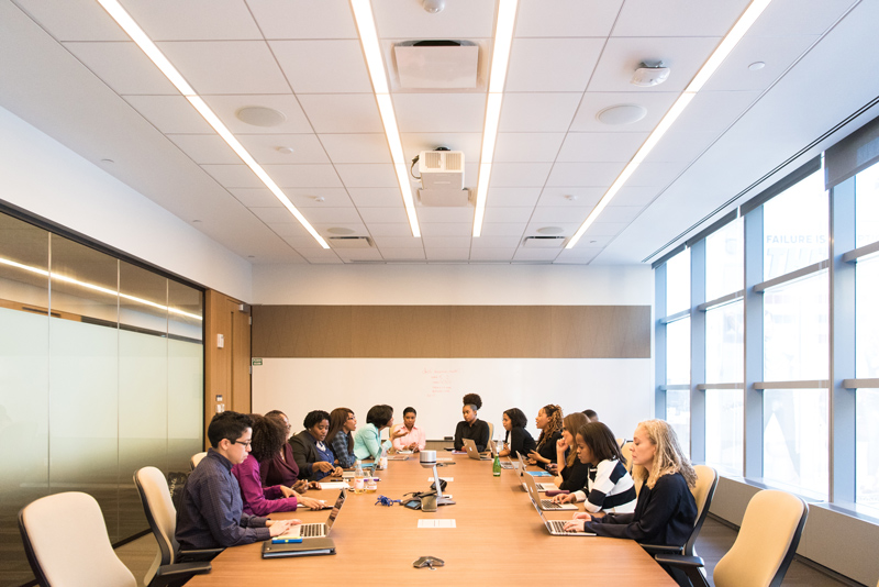 Photo of a group of people in a conference room