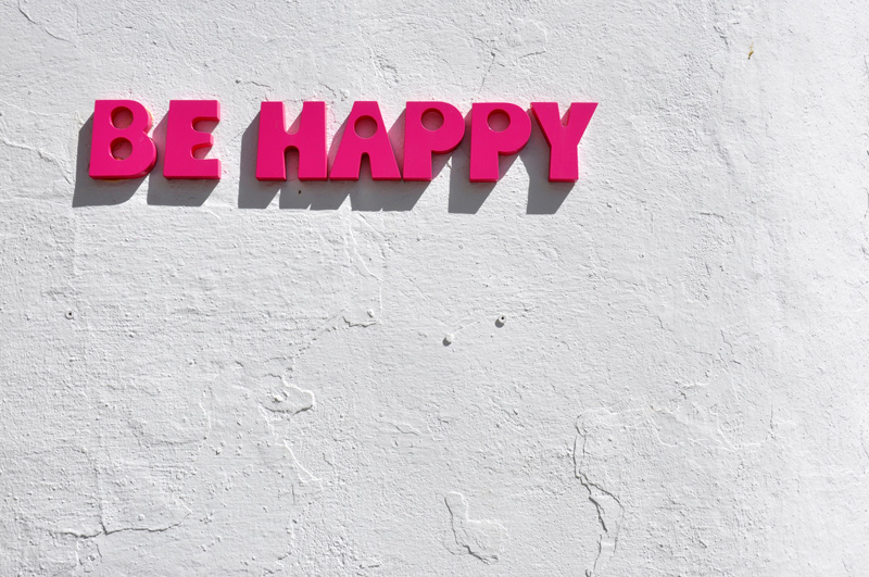 Happy Employees Stay Longer And Are More Productive Photo of block lettering of the words 'Be Happy'