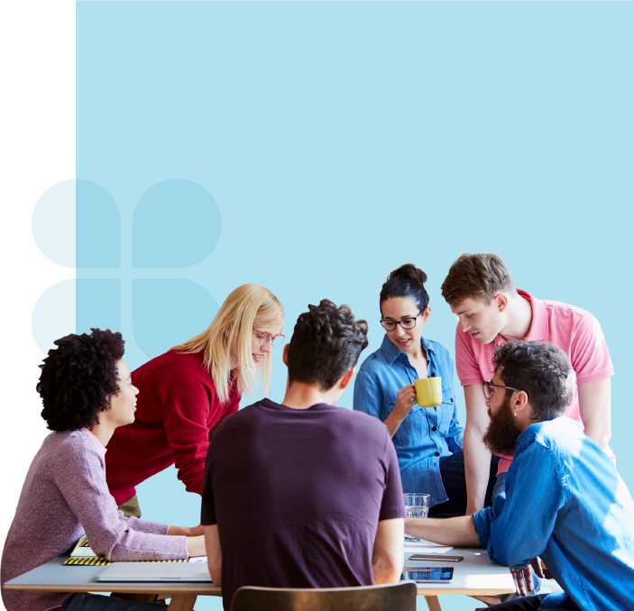 Create a culture of productive collaboration. Photo of a productive team collaborating.