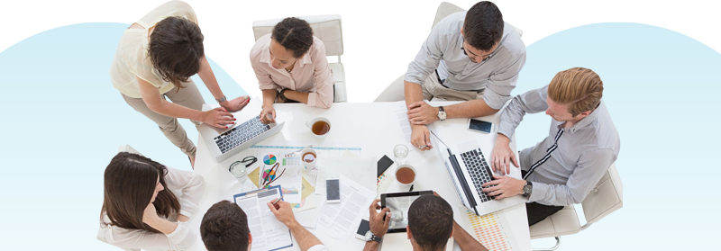 Use Simpli5 to solve challenges of culture, collaboration, leadership and productivity. Photo of a team from overhead.