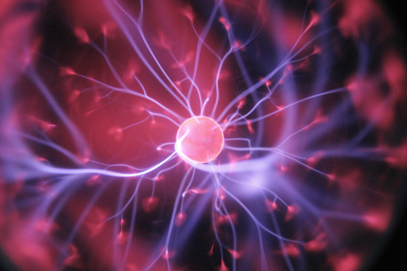 Graphic of a glowing neuron